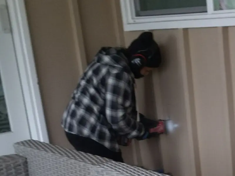 Professional electrician installing an exterior outlet in Macungie